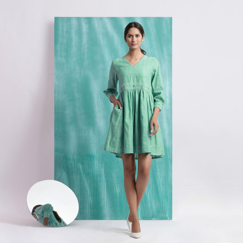 Front View of a Model wearing Ocean Green Handspun 100% Cotton Gathered Dress