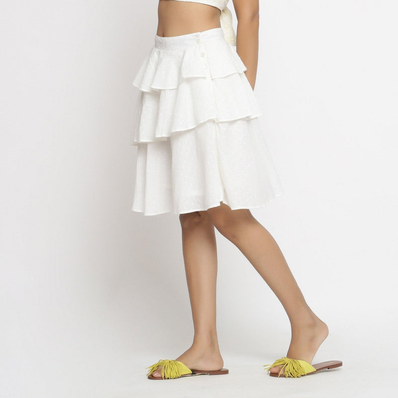 Left View of a Model wearing Off-White Cotton Dobby Ruffled Skirt