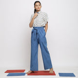 Front View of a Model wearing Off-White and Blue Vegetable Dyed Cotton Checkered Peter Pan Collar Shirt