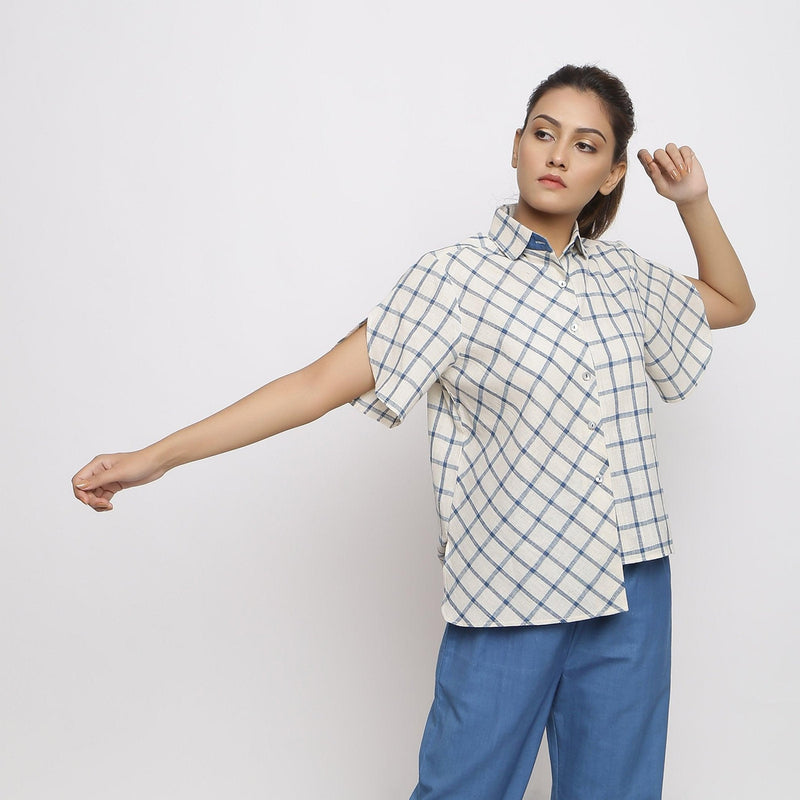 Front View of a Model wearing Off-White and Blue Vegetable Dyed Cotton Checkered Peter Pan Collar Shirt