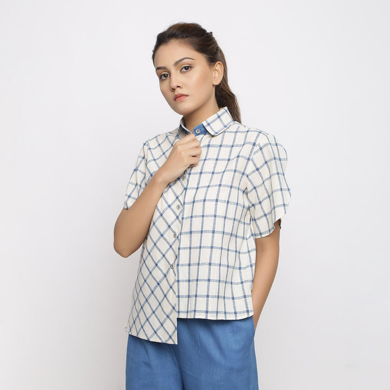 Front View of a Model wearing Off-White and Blue Vegetable Dyed Cotton Checkered Peter Pan Collar Shirt