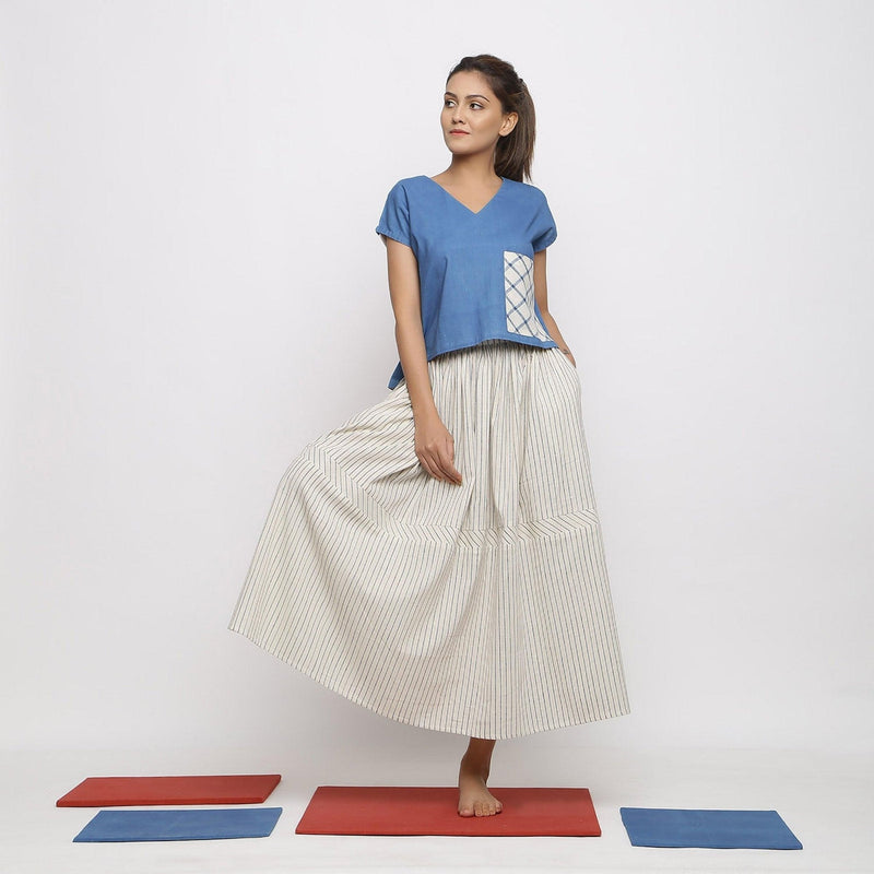 Front View of a Model wearing Vegetable Dyed Off-White Gathered Skirt