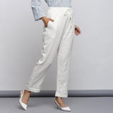 Right View of a Model wearing Off-White Crinkled Cotton Tapered Pant