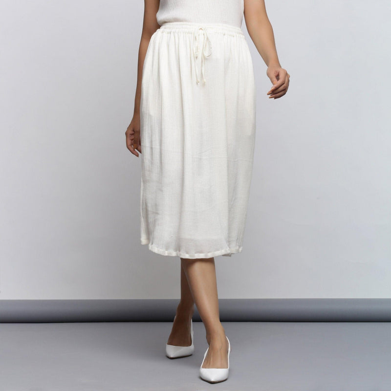 Front View of a Model wearing Off-White Crinkled Cotton Flared Skirt