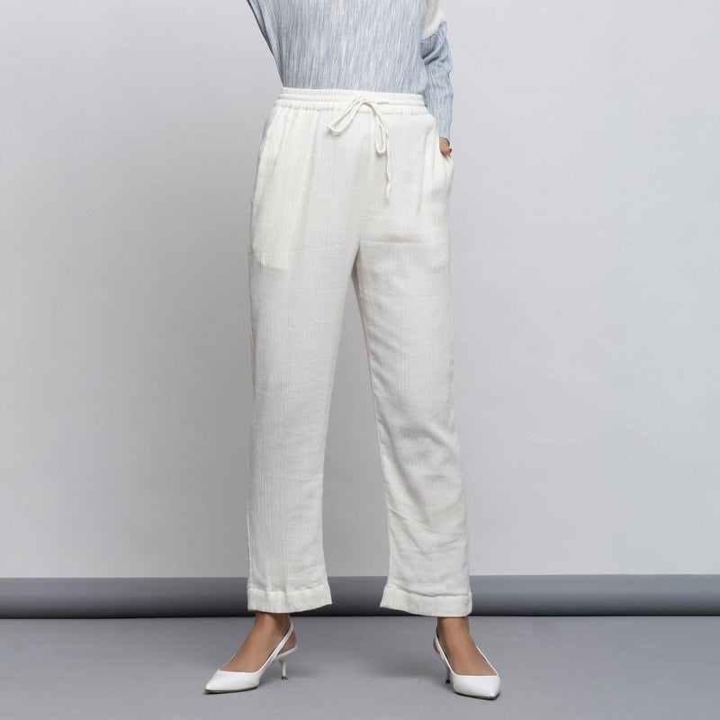 Front View of a Model wearing Off-White Crinkled Cotton Tapered Pant