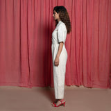 Left View of a Model wearing Off-White Embroidered Cotton Muslin High-Rise Overalls