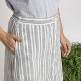 Front Detail of a Model wearing Handspun Off-White Button-Down Skirt