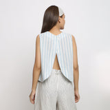 Back View of a Model wearing Handspun Asymmetrical V-Neck Wrap Top