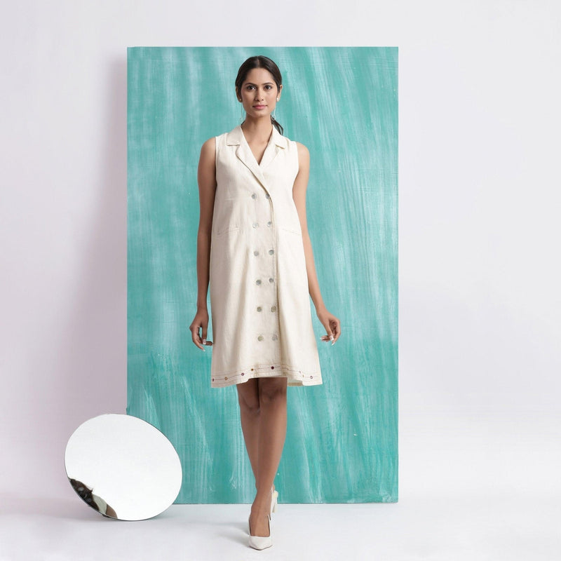 Front View of a Model wearing Off-White Handspun Cotton Muslin Button-Down Short Dress