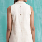 Back Detail of a Model wearing Undyed Button-Down Hand Mirror Work Dress