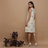 Back View of a Model wearing Off-White Paneled Sleeveless Cotton Dress