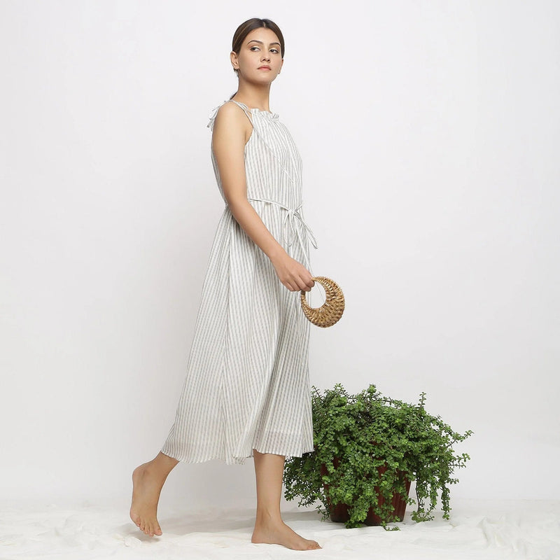 Right View of a Model wearing Strappy Handspun Flared Maxi Dress