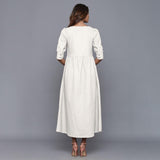 Back View of a Model wearing Off-White Cotton Flannel Gathered Dress