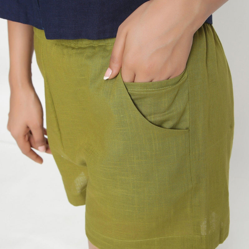 Left Detail of a Model wearing Olive Green Cotton Flax Short Shorts