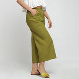 Right View of a Model wearing Olive Green Wide Legged Straight Pant