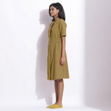 Back View of a Model wearing Olive Green Cotton Waffle Knee Length Coat Dress