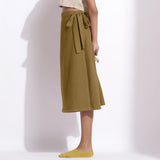 Left View of a Model wearing Olive Green Cotton Waffle Wrap Skirt