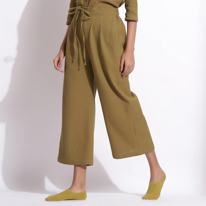 Left View of a Model wearing Olive Green Cotton Waffle Relaxed Culottes