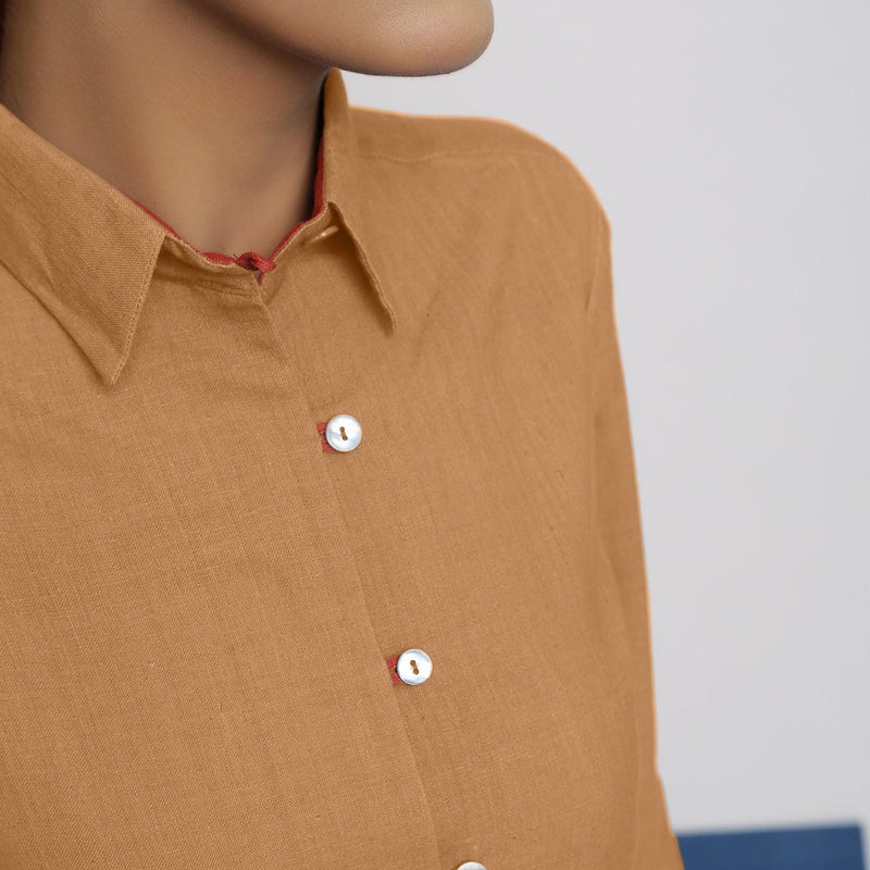 Front Detail of a Model wearing Rust Vegetable Dyed 100% Cotton Button-Down Shirt