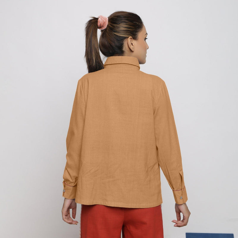 Back View of a Model wearing Rust Vegetable Dyed 100% Cotton Button-Down Shirt