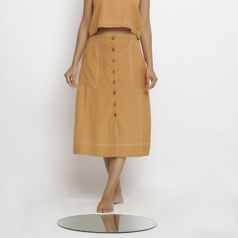 Front View of a Model Wearing Rustic Vegetable Dyed Button-Down Skirt