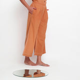 Right View of a Model wearing Vegetable Dyed Rustic Wide Legged Pant