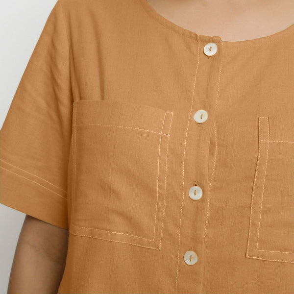 Front Detail of a Model wearing Rust Vegetable Dyed Romper