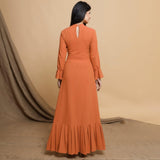 Back View of a Model wearing Orange Cotton Crew Neck Floor Length Tier Dress