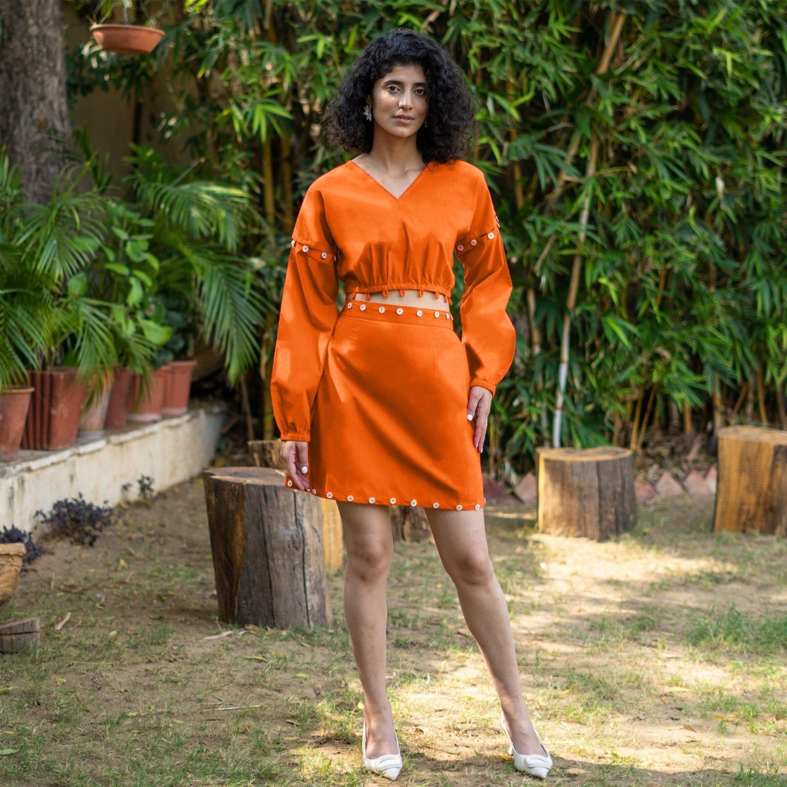 orange midi dress with sleeves Chic Rust Ruffled neckline and half sleeves for a balanced and stylish look Oddi Vibrant Floral Print Midi