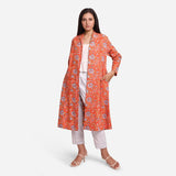 Front View of a Model wearing Orange Floral Block Printed Cotton Trench Coat