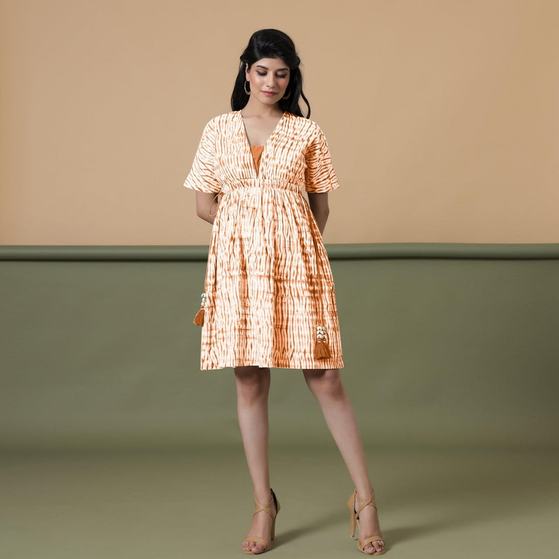 Front View of a Model wearing Orange Green Shibori Drop Shoulder Dress