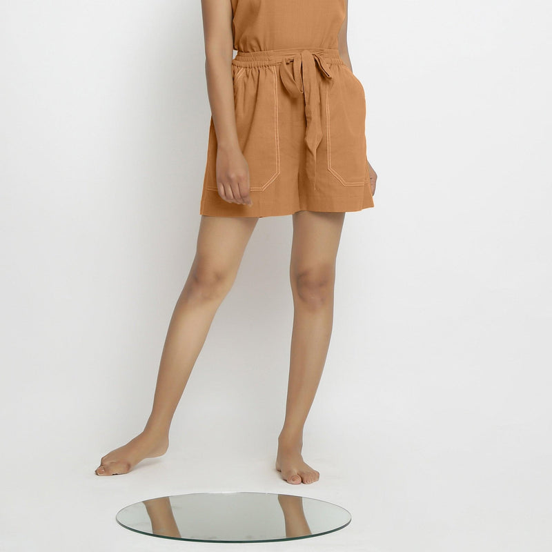 Front View of a Model wearing Rust Vegetable Dyed Handspun Short Shorts