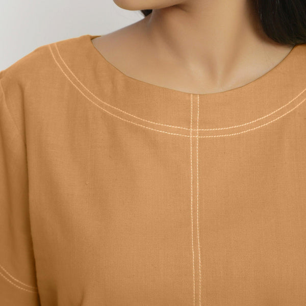 Front Detail of a Model wearing Vegetable-Dyed Orange 100% Cotton Paneled Top