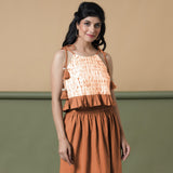 Front View of a Model wearing Orange Shibori Camisole Top