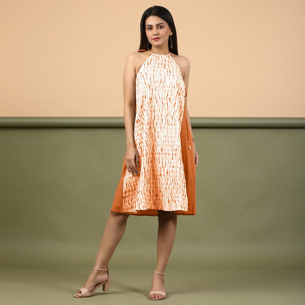 Front View of a Model wearing Orange Shibori Halter Neck A line Dress