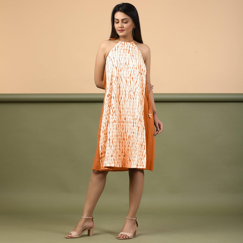 Front View of a Model wearing Orange Shibori Halter Neck A line Dress