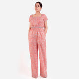 Front View of a Model wearing Peach Block Print Floor Length Cotton Jumpsuit