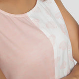 Front Detail of a Model wearing Peach Hand Block Printed Paneled Dress