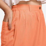 Right Detail of a Model wearing Peach Cotton Flax Wide Legged Straight Pant