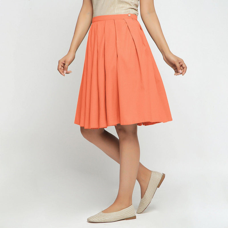 Left View of a Model wearing Peach Cotton Flax Pleated Skirt