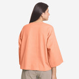 Back View of a Model wearing Peach Cotton Flax Round Neck A-Line Top