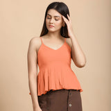 Front View of a Model wearing Peach Cotton Flax Slim Fit Pleated Camisole Top