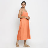 Right View of a Model wearing Peach Cotton Flax Strap Sleeve A-Line Dress