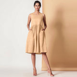 Front View of a Model wearing Cotton Peach Mellow Gathered Yoke Dress