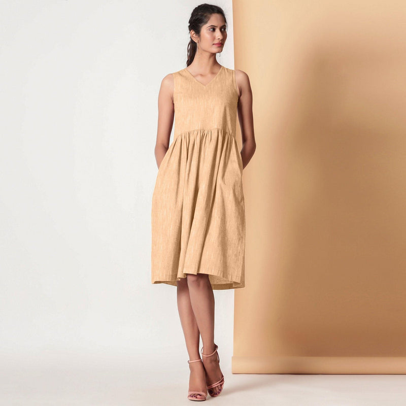 Front View of a Model wearing Cotton Peach Mellow Gathered Yoke Dress