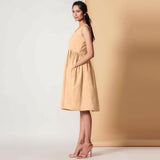 Left View of a Model wearing Cotton Peach Mellow Gathered Yoke Dress