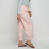 Right View of a Model wearing Peach Mid Rise Cotton Straight Pant