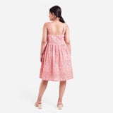 Back View of a Model wearing Peach Paisley Fit-and-Flare Cotton Dress