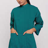 Front Detail of a Model wearing Pine Green 100% Linen Straight Jumpsuit