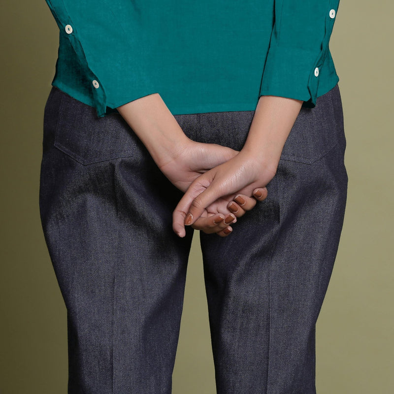 Back Detail of a Model wearing Solid Pine Green Linen Button-Down Straight Shirt